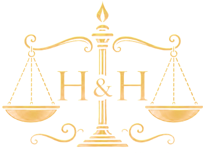 Balanza de la justicia con las iniciales H&H